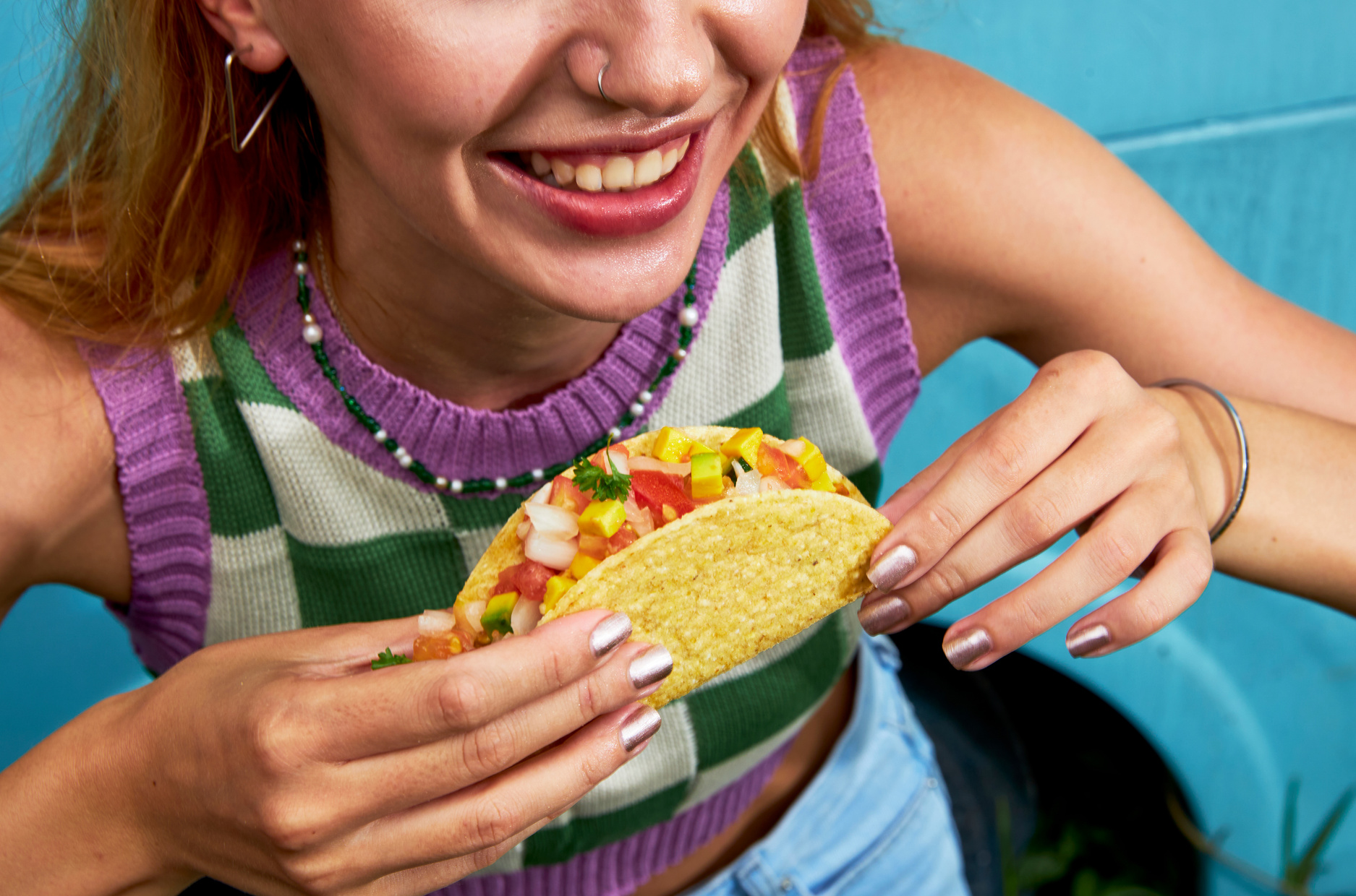 Woman Enjoying Plant-Based Taco 